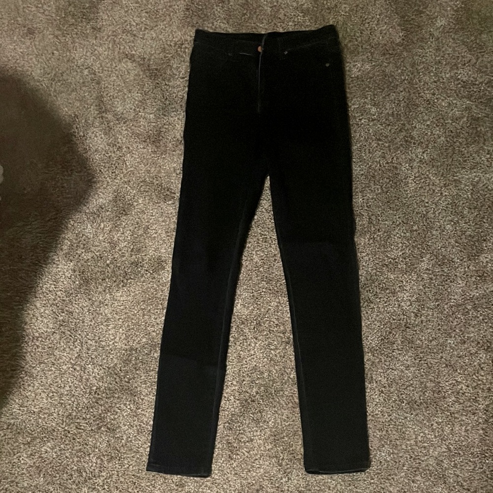 High waisted skinny jeans. Dark blue wash.